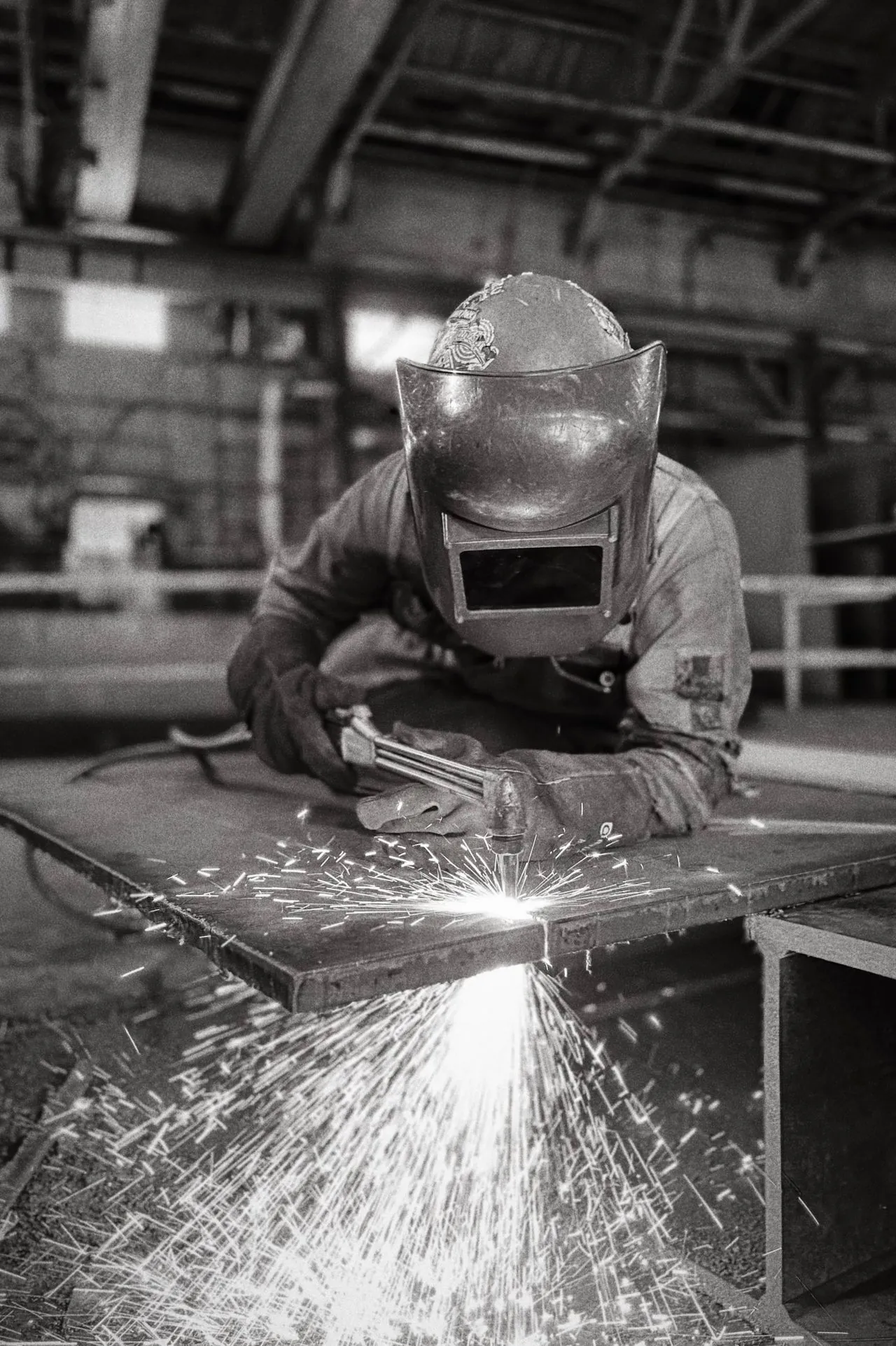 Manufacturing professional working with industrial equipment